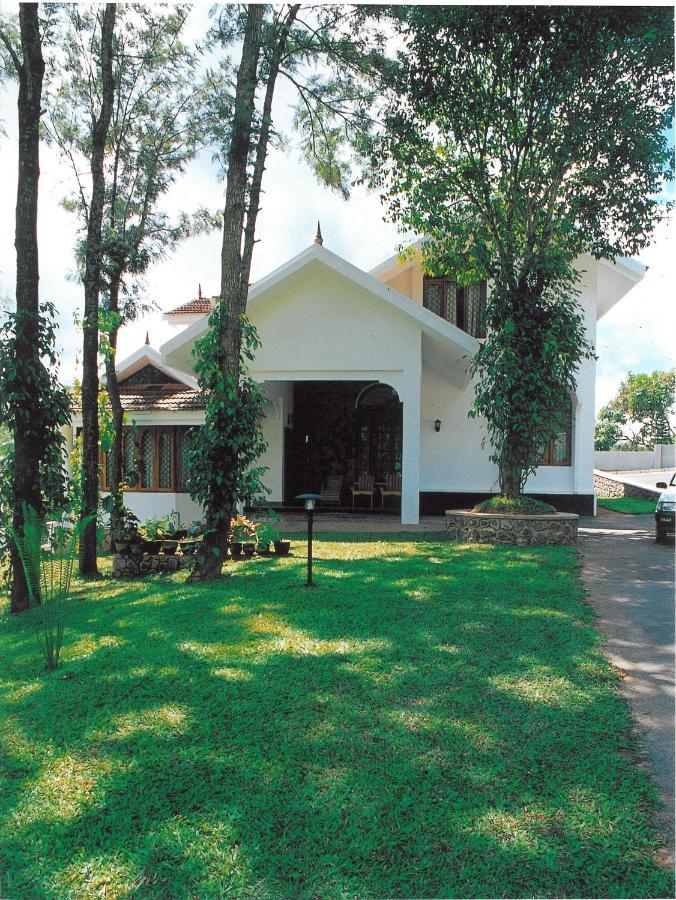Hotel Treetop Thekkady Bagian luar foto